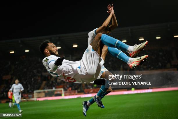 Marseille's French-Gabonese forward Pierre-Emerick Aubameyang celebrates scoring his team's second goal during the French L1 football match between...