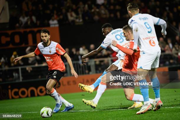 Marseille's Congolese defender Chancel Mbemba shoots and scores his team's first goal during the French L1 football match between FC Lorient and...