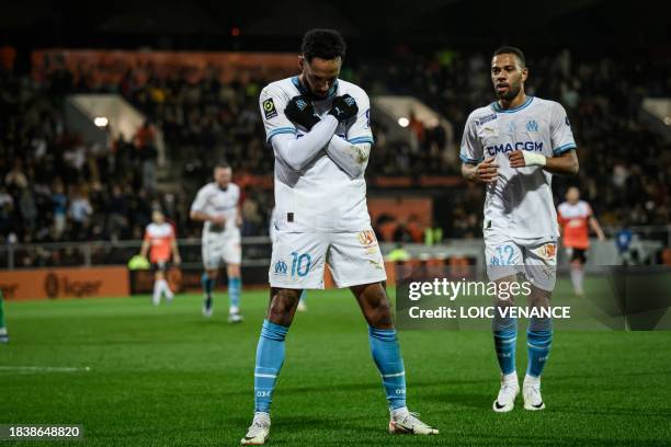 Marseille's French-Gabonese forward Pierre-Emerick Aubameyang celebrates after scoring a goal during the French L1 football match between FC Lorient...