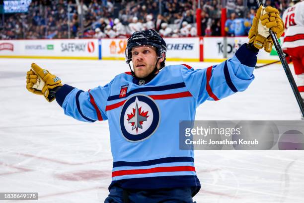 Nikolaj Ehlers of the Winnipeg Jets celebrates his second period goal against the Carolina Hurricanes at Canada Life Centre on December 04, 2023 in...
