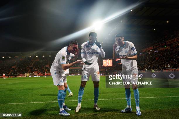 Marseille's French-Gabonese forward Pierre-Emerick Aubameyang celebrates with teammates after scoring a goal during the French L1 football match...