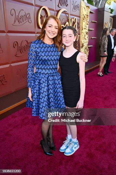 Alyson Hannigan and Satyana Marie Denisof at the premiere of "Wonka" held at Regency Village Theatre on December 10, 2023 in Los Angeles, California.