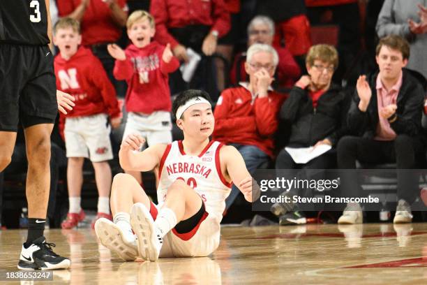 Keisei Tominaga of the Nebraska Cornhuskers hits the floor after being fouled against the Michigan State Spartans in the second half at Pinnacle Bank...
