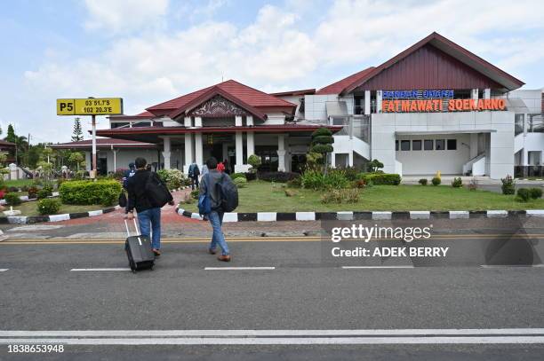 Passengers arrive at the Fatmawati Soekarno airport in Bengkulu, Bengkulu province, Sumatra on December 10, 2023.