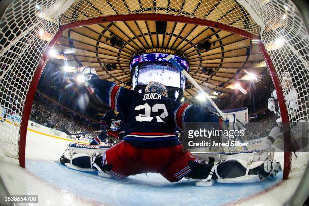 Jonathan Quick of the New York Rangers makes a save against Carl Grundstrom of the Los Angeles Kings at Madison Square Garden on December 10, 2023 in...