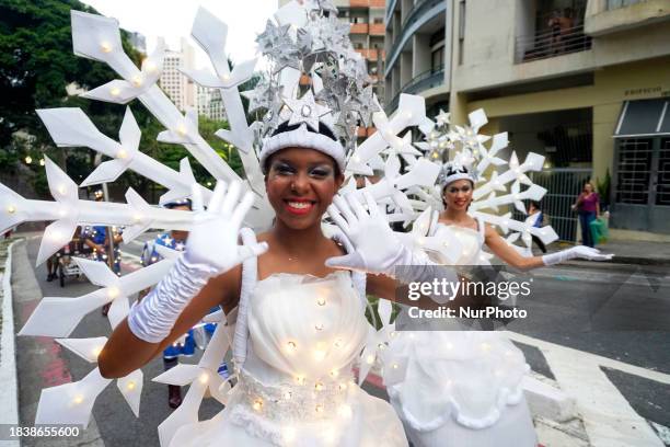 People are participating in the Parade of Lights in the center of Sao Paulo, Brazil, on December 8, 2023. The event is part of the Sao Paulo...