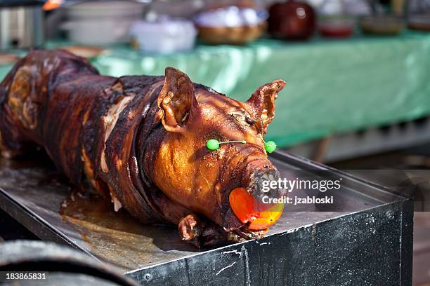 roast pig - spit stock pictures, royalty-free photos & images