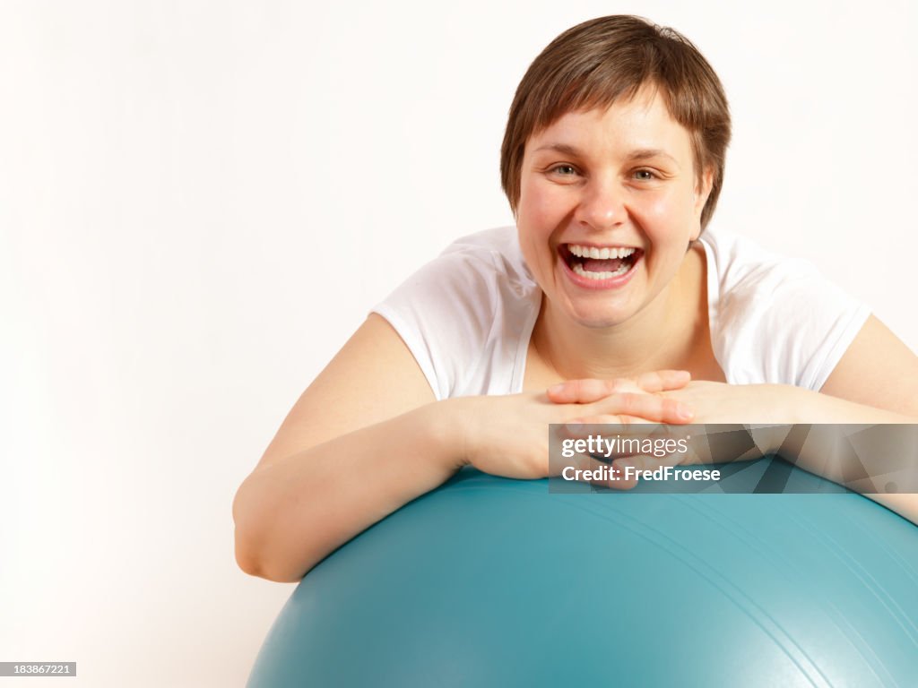 Woman with gymnastic ball