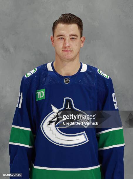 Nikita Zadorov of the Vancouver Canucks poses for his official NHL headshot before their NHL game against the New Jersey Devils at Rogers Arena on...
