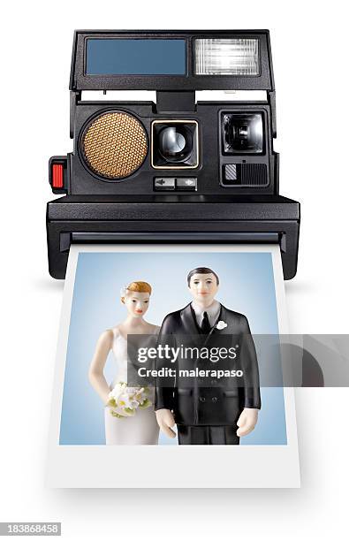 instant for life. photo of wedding cake topper. - wedding cake figurine stock pictures, royalty-free photos & images