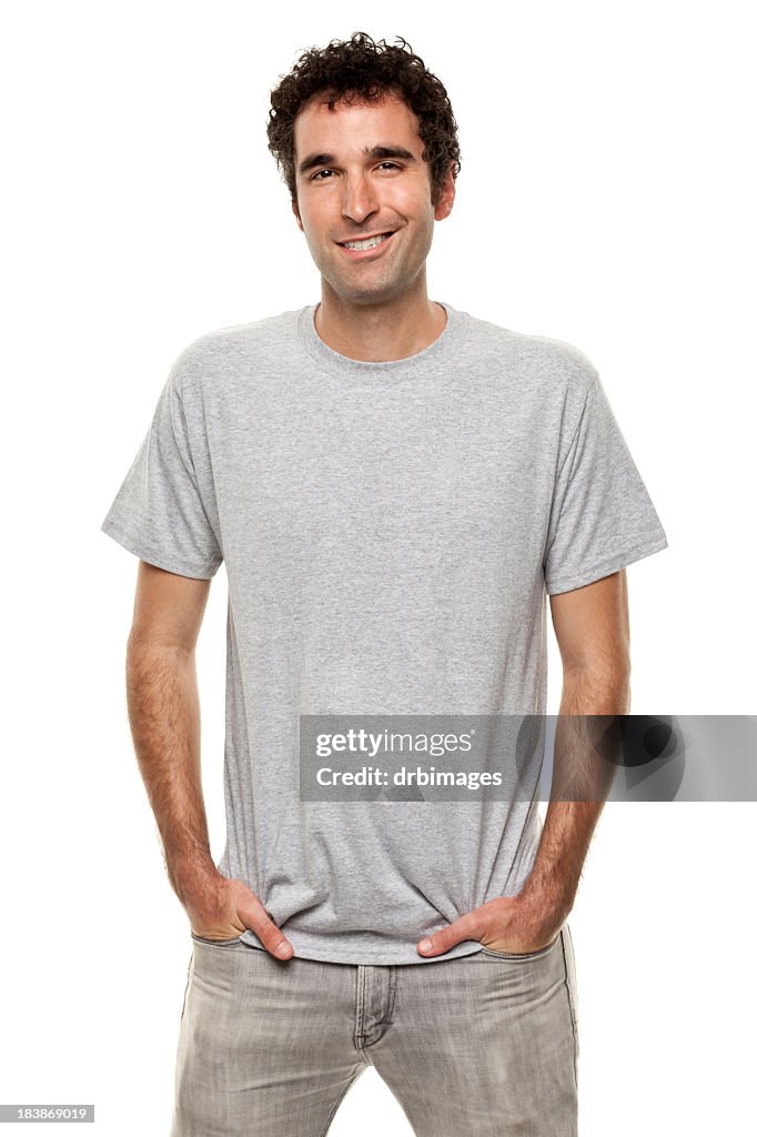 Smiling Man Posing WIth Hands In Pockets