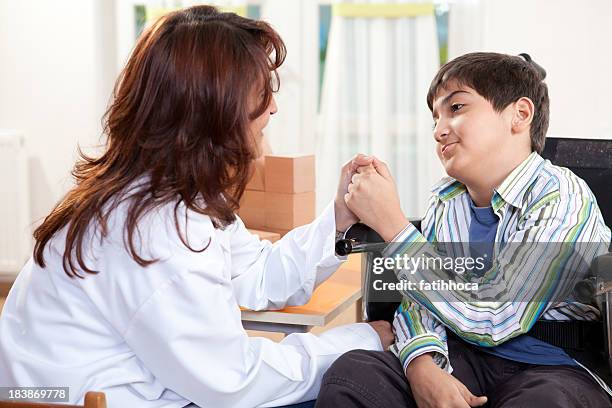 Developmental Disability Boy 1,672 Developmental Disability Doctor Stock Photos, High-Res Pictures ...