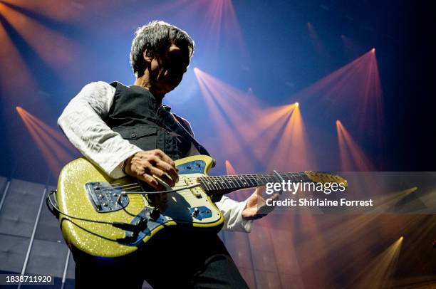 Johnny Marr performs during A Night With The Johnny Marr Orchestra, the inaugural live show at new venue Aviva Studios, Factory International on...