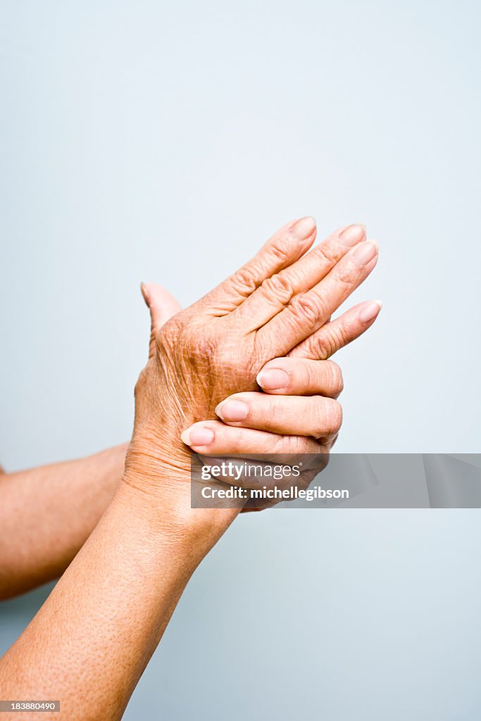 Elderly woman's with arthritis in her hands