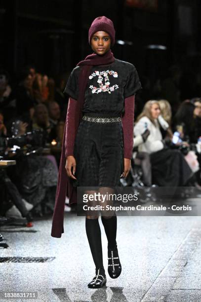Model walks the runway during the CHANEL Metiers D'Art Show on December 07, 2023 in Manchester, England.