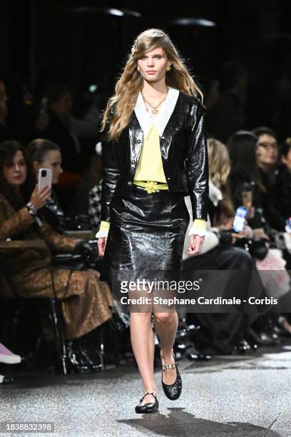Model walks the runway during the CHANEL Metiers D'Art Show on December 07, 2023 in Manchester, England.