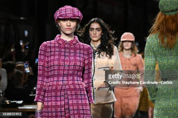 Models walk the runway during the CHANEL Metiers D'Art Show on December 07, 2023 in Manchester, England.
