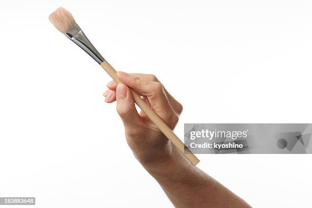 isolated shot of working painter hand on white background - paintbrush stock pictures, royalty-free photos & images