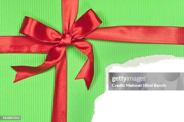 torn green gift box - unwrapped stock pictures, royalty-free photos & images