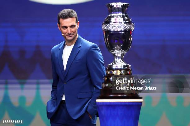 Lionel Scaloni, Head Coach of Argentina, presents the Copa America trophy during the official draw of CONMEBOL Copa America 2024 at James L. Knight...
