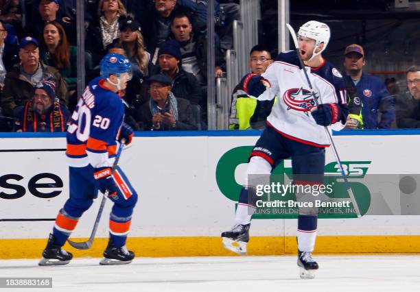 Adam Fantilli of the Columbus Blue Jackets celebrates his goal against the New York Islanders at 10:08 of the second period at UBS Arena on December...