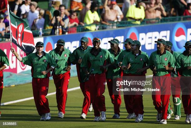 The Kenyan team celebrate victory and qualification for the Super Six stage during the ICC Cricket World Cup Pool B match between Kenya and...