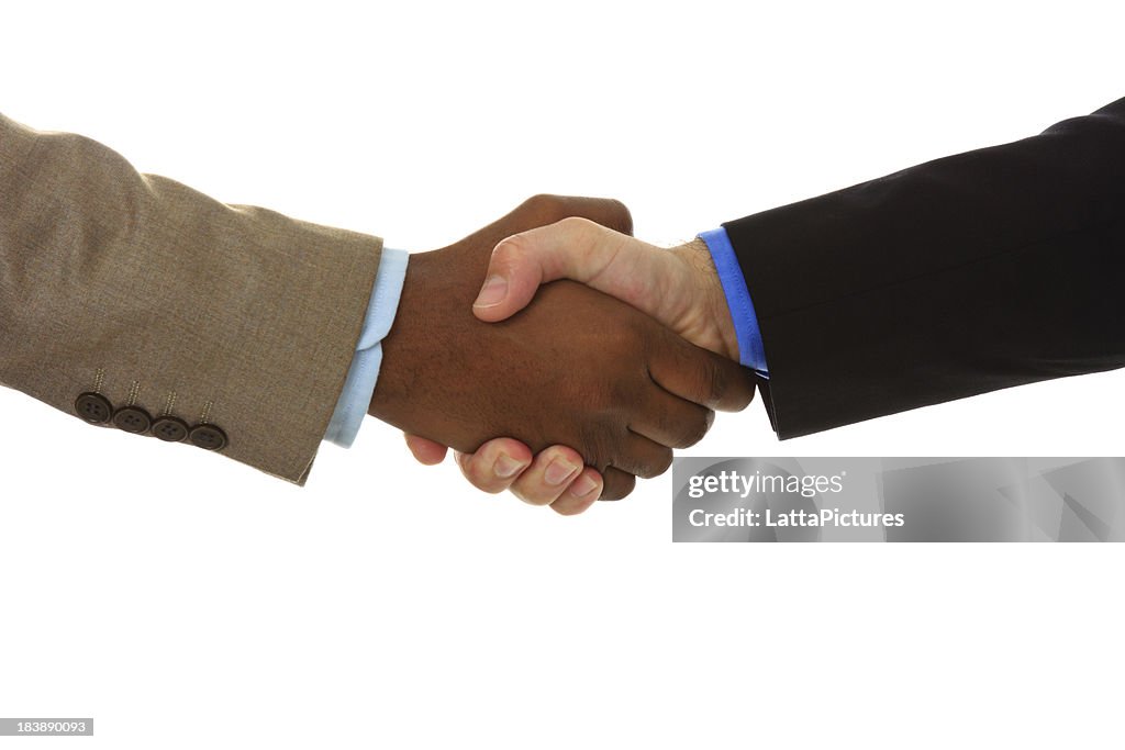 Plano aproximado de aperto de mão entre dois Empresário