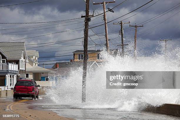 ocean flooding red car - tsunami wave stock pictures, royalty-free photos & images