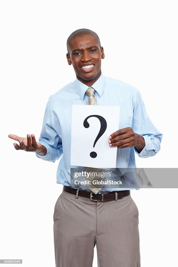 Man In Question Confused Looking Man Holding A Question Mark Sign High-Res Stock Photo ...