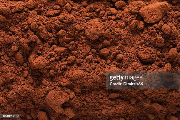 cocoa powder hintergrund - gemahlen stock-fotos und bilder