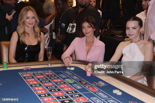 Heather Graham, Sarah Hyland and Bobbi Althoff play roulette at the star-studded launch party for official debut of craps, roulette and sports...