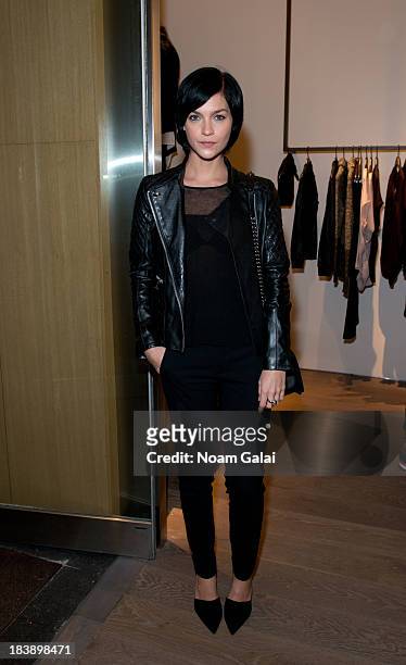 Model Leigh Lezark attends the grand opening of Vince Flagship Store on October 9, 2013 in New York City.