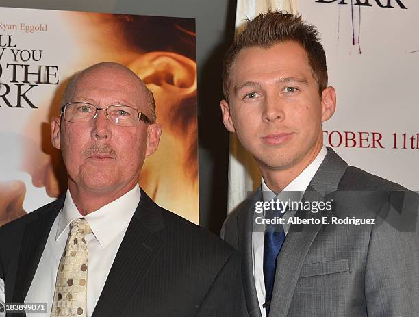 Executive producer David Robinson and writer/director Mark Edwin Robinson attend the premiere of Epic Pictures' "I Will Follow You Into The Dark" at...