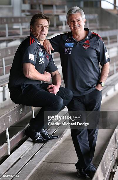 New Bombers coach Mark Thompson flexes his muscles with new Senior Assistant coach Neil Craig during an Essendon Bombers AFL press conference at...