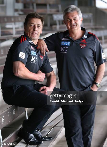 New Bombers coach Mark Thompson flexes his muscles with new Senior Assistant coach Neil Craig during an Essendon Bombers AFL press conference at...