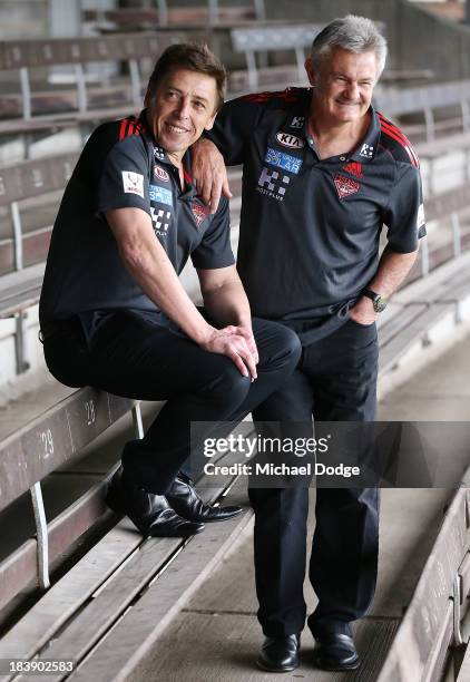 New Bombers coach Mark Thompson and new Senior Assistant coach Neil Craig react during an Essendon Bombers AFL press conference at Windy Hill on...