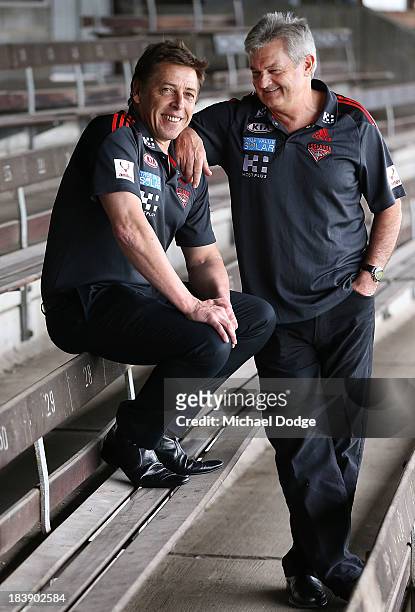 New Bombers coach Mark Thompson and new Senior Assistant coach Neil Craig react during an Essendon Bombers AFL press conference at Windy Hill on...