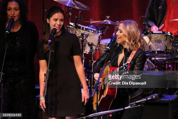 Natalie Barden and Sheryl Crow perform onstage during the Artist For Action Concert Benefit for Sandy Hook Promise at NYU Skirball Center on December...