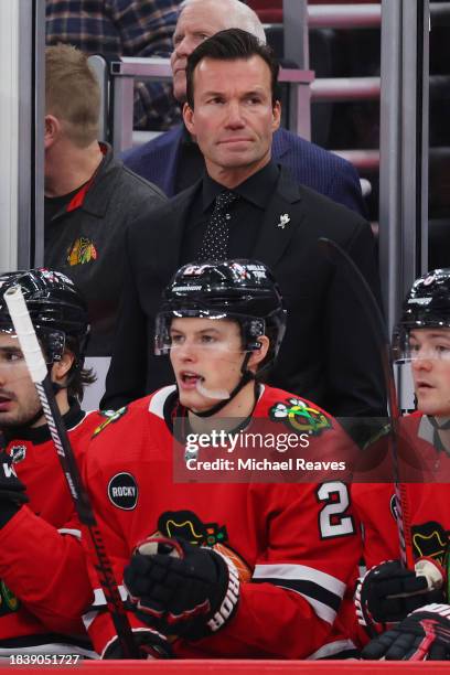 Head coach Luke Richardson of the Chicago Blackhawks looks on against the Anaheim Ducks during the second period at the United Center on December 07,...