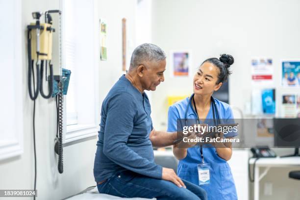 seniors check-up - nurse stock pictures, royalty-free photos & images