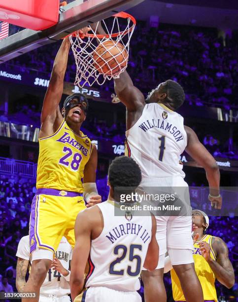 Rui Hachimura of the Los Angeles Lakers dunks against Zion Williamson of the New Orleans Pelicans in the first half of the West semifinal game of the...