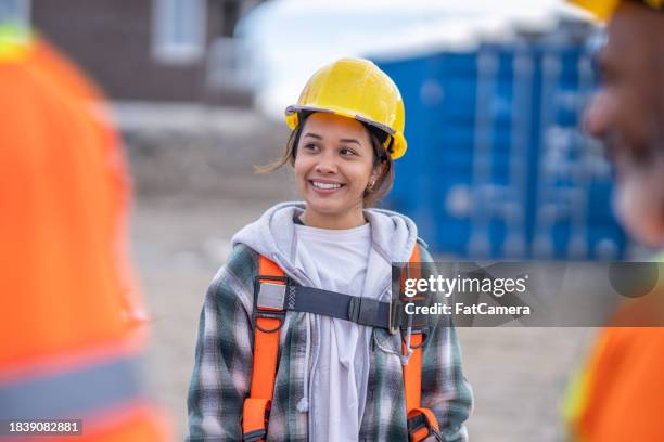 female construction worker portrait - hardhat stock pictures, royalty-free photos & images