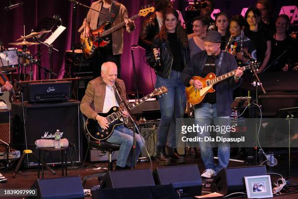 Peter Frampton and Mark Barden perform onstage during the Artist For Action Concert Benefit for Sandy Hook Promise at NYU Skirball Center on December...