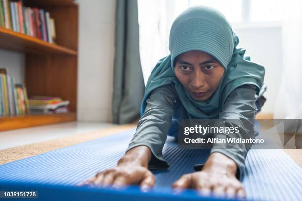 home workout - yoga mat stock pictures, royalty-free photos & images