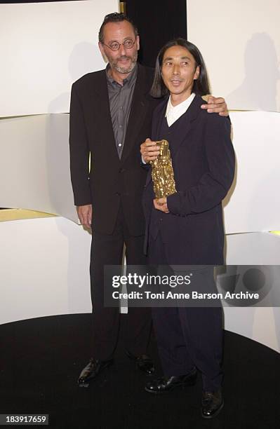 Jean Reno & Tetsuo Nagata during Cesar Awards Ceremony 2002 - Press Room at Chatelet Theater in Paris, France.