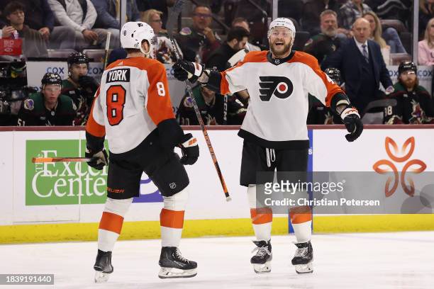 Cam York and Nicolas Deslauriers of the Philadelphia Flyers celebrate after York scored a goal against the Arizona Coyotes during the third period of...