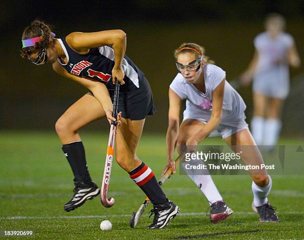 Herndon's Katherine Wilson, left, gains control of the ball against Westfield's Emily McNamara, right, during Westfield's defeat of Herndon 7 - 1 in...
