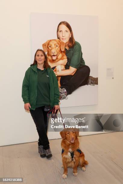 Zoe & Rhubarb attends the exhibition opening preview of "Dogs with Jobs" by Rankin hosted by George, The Caring Family Foundation and The Kennel Club...
