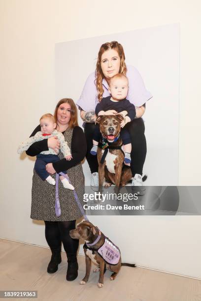 Amee & Belle attends the exhibition opening preview of "Dogs with Jobs" by Rankin hosted by George, The Caring Family Foundation and The Kennel Club...