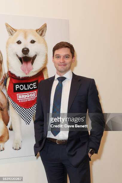 Rich Preston attends the exhibition opening preview of "Dogs with Jobs" by Rankin hosted by George, The Caring Family Foundation and The Kennel Club...